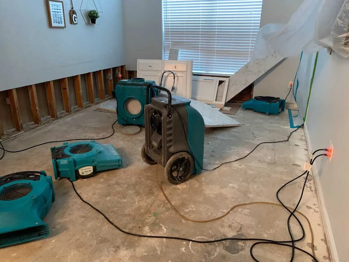 Dehumidifier in flood-cut room for Water Damage Restoration in East Cleveland